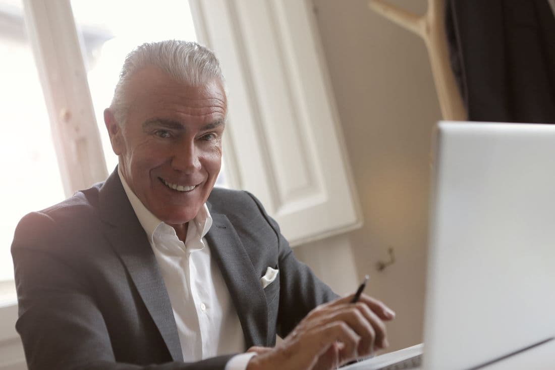 A person reviewing dental coverage options online.